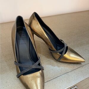 Brunello Cucinelli Gold Pointed-Toe Pumps with Black Cross Straps